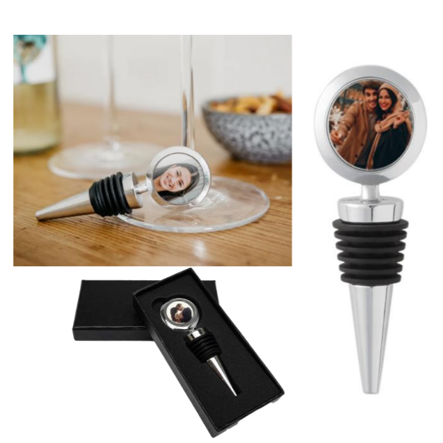 Wine bottle stopper with photo engraving on a wooden table with a glass and snacks.